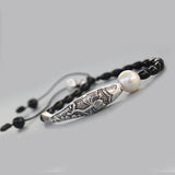 Silver Lucky Fish bracelet close up view