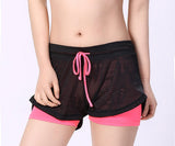 Rose Yoga Shorts - front view on model