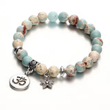 Beaded Ohm Bracelet with star charm - angled with shadow