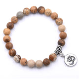 Wood toned 8mm beaded bracelet with Om charm