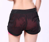 Rose Yoga Shorts - back view on model