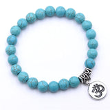 Turquoise 8mm beaded bracelet with Om charm