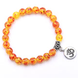 Fiery Orange 8mm beaded bracelet with Om charm